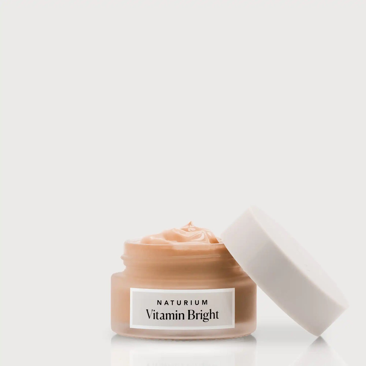 vitamin-bright-illuminating-eye-cream-c2 NATR-VitaminBright_DEEP_Primary_front_openjar_bone.webp