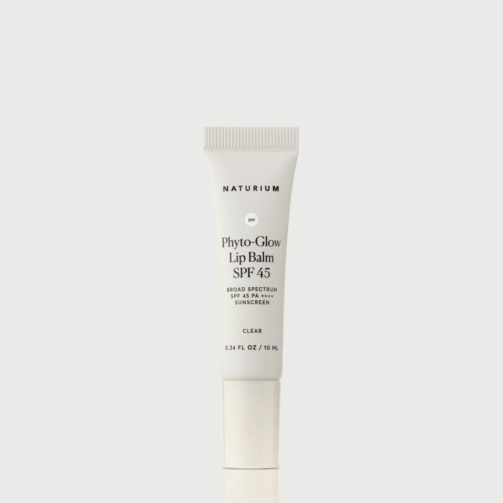 phyto-glow-lip-balm-spf-45-clear-i4 NATR-10124_PhytoGlow_SPF_Clear_primary_capon_front_bonebkgd_1.webp