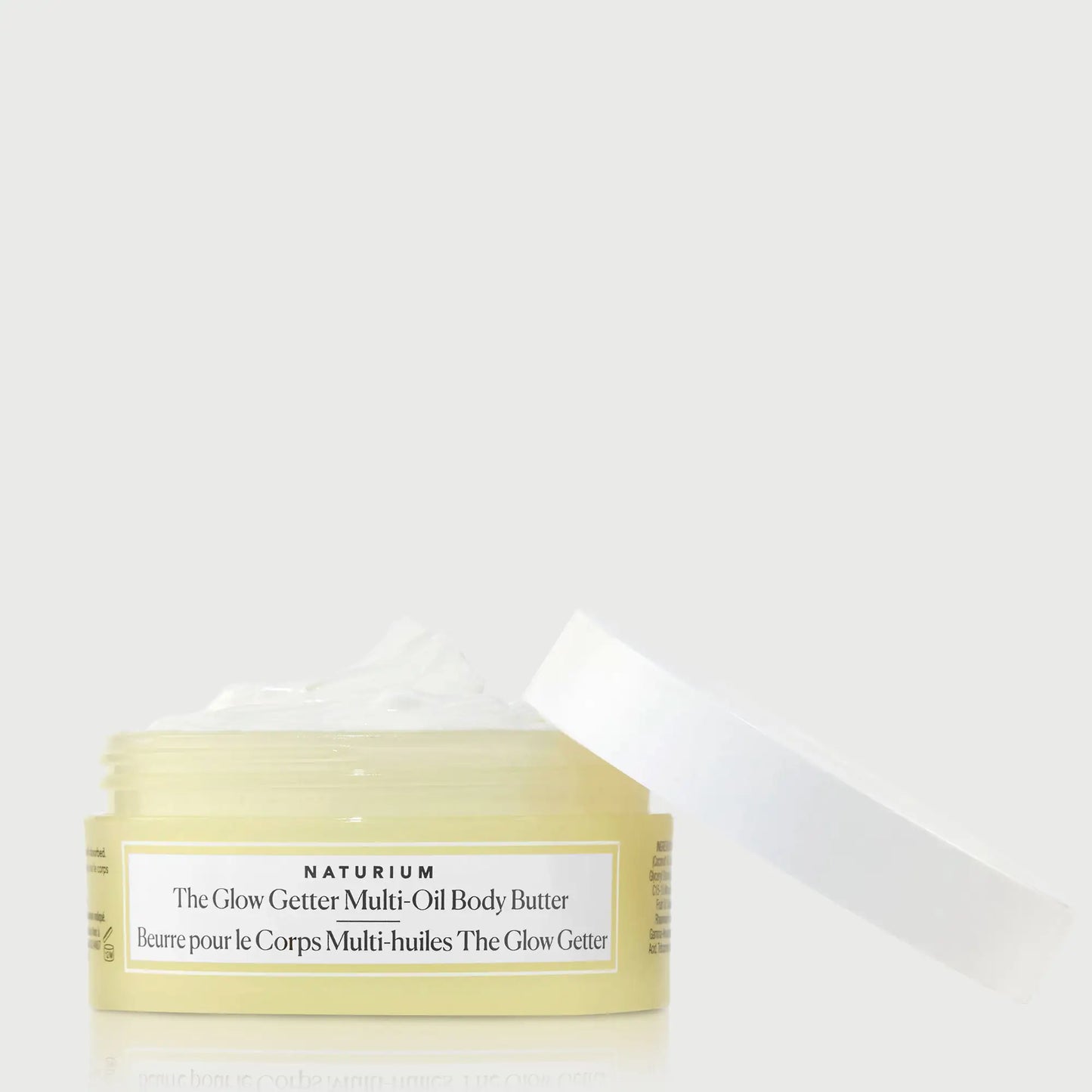 the-glow-getter-multi-oil-body-butter-travel-size-f5 NATR-40115_Glow-Getter-Body-Butter-Mini_front_capoff_bonebkgd.webp